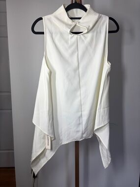 Asymmetrical Sleeveless White Drape Top by Commense.